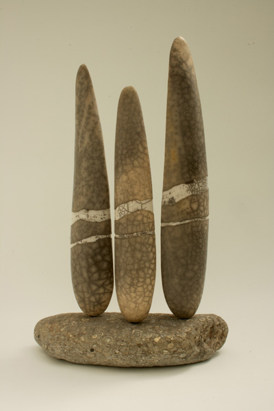  3 forms on fossil stone 55 x 38 x 17cm  